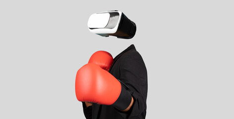 Poster - A person is using virtual reality goggles while wearing red boxing gloves. The individual is isolated against a neutral background, emphasizing the modern technology and immersive experience.