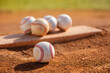 © Eric Hood - Several baseballs on pitcher's mound at little league field