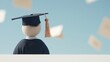 © Pro Hi-Res - Graduation celebration with a doll in a cap, surrounded by flying diplomas on a sunny day.