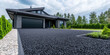 © dinastya - Rubber crumb pavement on the driveway to the country house. Automobile rubber driveway