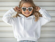 © Елена Сорокина - Bright summer day with a girl in white hoodie and heart-shaped sunglasses