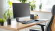 © watcharee - A modern workspace featuring a sleek desk, computer monitor, keyboard, mouse, and decorative plants for a fresh, productive environment.
