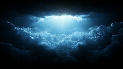 Wall Mural - Bright light shining through dark, dramatic clouds at night.