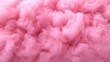 © leymart - Close-up of fluffy, pink cotton candy texture.