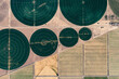 © Westend61 - Aerial view of irrigation circles in the USA showcasing agricultural patterns