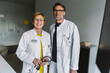 © Westend61 - Portrait of two confident doctors