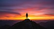 © Qstock - Silhouette of a Person on Mountain Summit During Vibrant Sunset, Capturing Nature's Beauty and Tranquility
