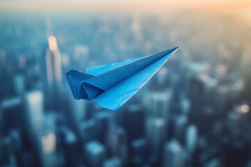 Aufkleber - Blue paper airplane flying above a city skyline at sunset capturing the essence of imagination and creativity