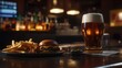 © รุ่งอรุณ ศรีนรสิทธิ์ - A cold pint of beer with a frothy head, set next to a plate of crispy fries and a burger, on a bar countertop.