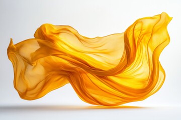 Poster - Flowing yellow fabric gracefully dances in the air, showcasing vibrant movement and texture in a soft light setting