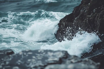 Wall Mural - a close up of ocean waves crashing to rocks