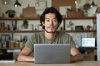 © Dennis - Asian Entrepreneur Using Laptop to Manage Business from Home