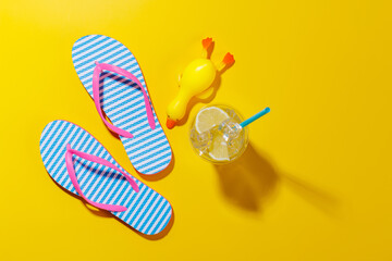 Poster - A vibrant summer vacation scene with flip flops and cocktail