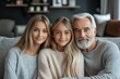 © Leo Rohmann - Three generation family portrait with elderly man and young women in modern home environment expressing connection elegance and warmth in cozy indoor setting