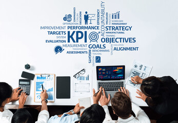 Aufkleber - A team of professionals engaged in a strategic meeting focusing on KPI evaluation, using data analysis tools to drive performance improvement and align objectives effectively. Amity