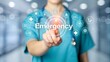 © Nazmul - Doctor touching hologram screen text emergency