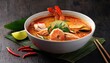© V.Semeniuk - Delicious Tom Yam Soup showcases traditional Thai flavors with fresh ingredients