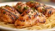 © Visioner - Grilled Chicken with Spaghetti on a White Plate