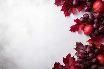 Aufkleber - Colorful autumn leaves and fresh fruits create a vibrant arrangement on a white surface, offering ample space for seasonal text or promotional content
