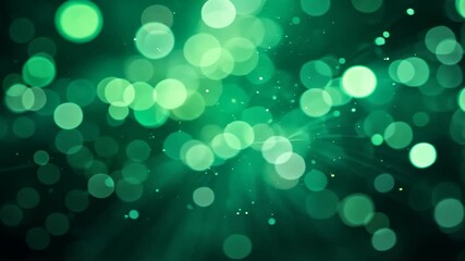 Wall Mural - abstract green bokeh background with circular light particles and light rays