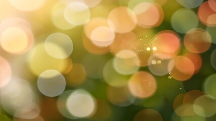 Wall Mural - warm orange and yellow bokeh with dreamy soft focus over green background