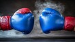 © Nunung - Boxing gloves facing each other in smoke.