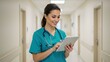 © Qbertstudio - Smiling Hispanic female nurse in hospital hallway uses a digital tablet, Soft, diffused lighting creates calming atmosphere, Demonstrates technology in healthcare,