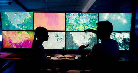 Poster - Computer, screen and maps with people in control room for storm tracking, satellite forecast or planning weather pattern. Back, meteorology team or radar data for climate monitor, silhouette or night