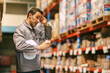 © Quality Stock Arts - Male worker drinking coffee feel tired sleepy hard work overnight working indoor warehouse building