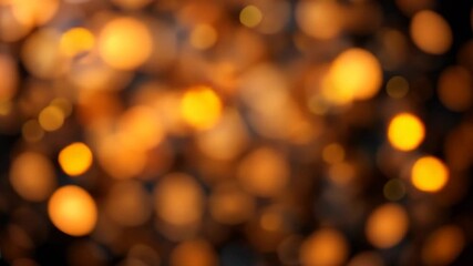Wall Mural - Blurred Golden Bokeh Lights Against Dark Background Abstract Festive Atmosphere