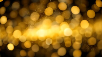 Wall Mural - golden bokeh abstract background with circular sparkling lights on a dark background