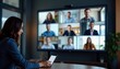 © ONCOM - Woman in Video Conference with Colleagues on Large Screen