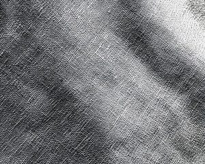 Wall Mural - A black and white photo of a piece of fabric with a pattern