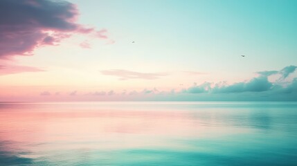 Poster - Soft pastel lavender and teal colors blend beautifully over a tranquil sea at sunrise