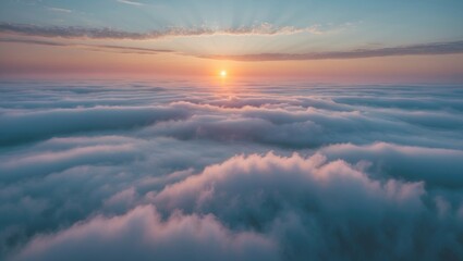 Wall Mural - at dawn, the camera ascends above the thick fog over the beautiful ocean of clouds. the sun rises ov