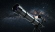 © Akstem - A telescope pointed at the stars and the milky way in the night sky.
