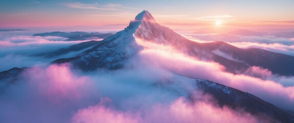 Wall Mural - a mystical dense fog surrounds the mountain summit illuminated by the rays of the rising sun. aerial