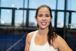 © Wavebreak Media - Playing padel tennis, woman in sportswear feeling confident and energetic outdoors