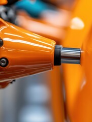 Fototapete - Future of Mobility Sleek Electric Vehicle Robotic Assembly with High-Gloss Orange Industrial Precision - Next-Gen Automotive Manufacturing Innovation