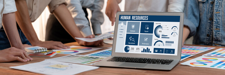 Leinwandbilder - Human resources management software on computer screen helping human resources employee to manage recruitment, payroll, staff searching and KPI evaluation brisk
