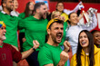 © Mediteraneo - Football, soccer fans are cheering for their team at the stadium on the match.
