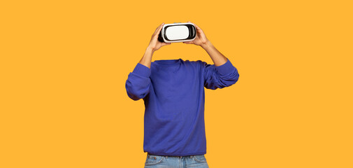 Poster - A person is immersed in virtual reality using a headset, showcasing a modern approach to technology. The bright background enhances the futuristic theme of the experience.