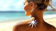© Iurii - Woman's back with glowing skin and sunscreen at sunny beach with sun symbol