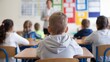 © Mr. Muzammil - A boy sits at a desk in a classroom