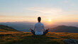 © siraphol - person meditating at sunrise, finding inner peace in nature beauty