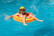 © Volodymyr - Child in pool in summer day. Children playing in swimming pool. Kids holidays and vacation concept.