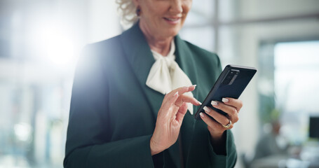 Fototapete - Hands, mature and business woman with mobile in office for networking, investment or financial news. Phone, corporate ceo and check email for profit growth, private equity or smile at venture capital