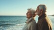 © ye - Romantic senior couple by the ocean. Affectionate elderly couple enjoying spending some quality time together after retirement, Generative AI