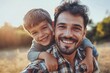 © cui - Happy smiling father giving son ride on back