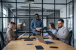 © standret - Business conception. Professional workers are in the modern office together